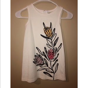 Girls summer dress with painted style flower.